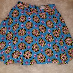 Flying tomato skater skirt